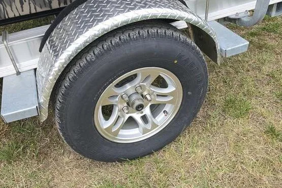 Slide: The Image of Trailer wheel with diamond plate fender, Havoc 1760 VJST, 2026 model. - 7