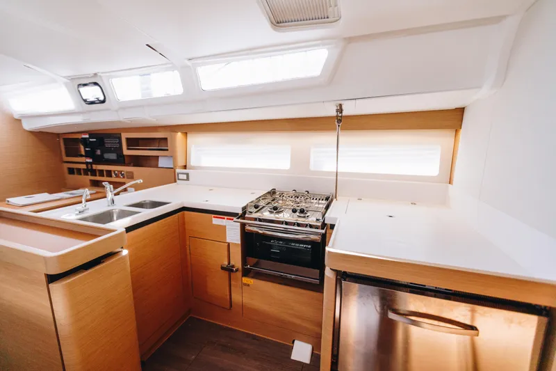 Slide: The Image of Modern kitchen interior of 2023 Jeanneau Sun Odyssey 490 yacht. - 37