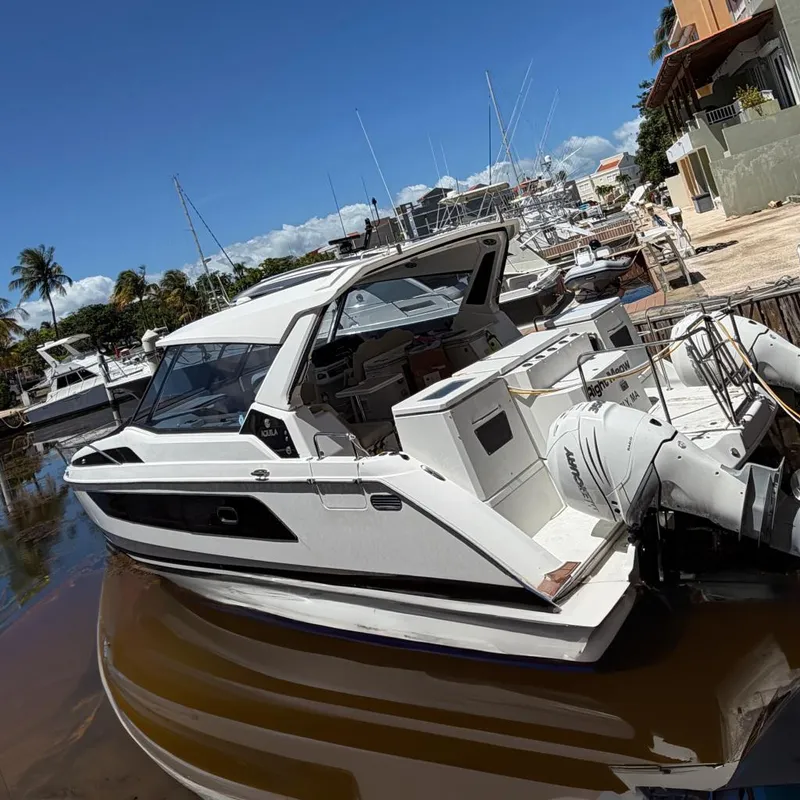 The Image of Aquila 36 Sport 2018 motorboat docked on a sunny day. - 0