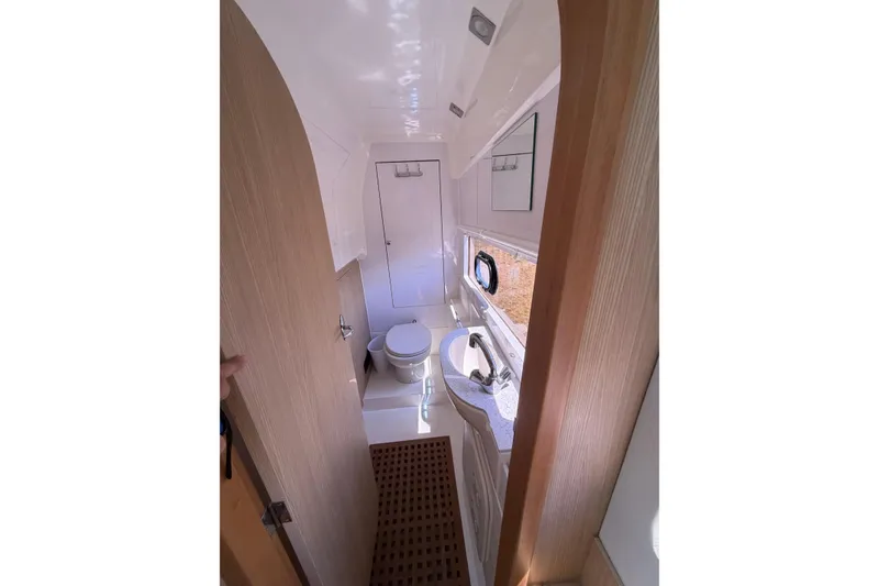 Slide: The Image of Interior view of 2018 Aquila 36 Sport yacht bathroom with modern fixtures and wooden accents. - 11