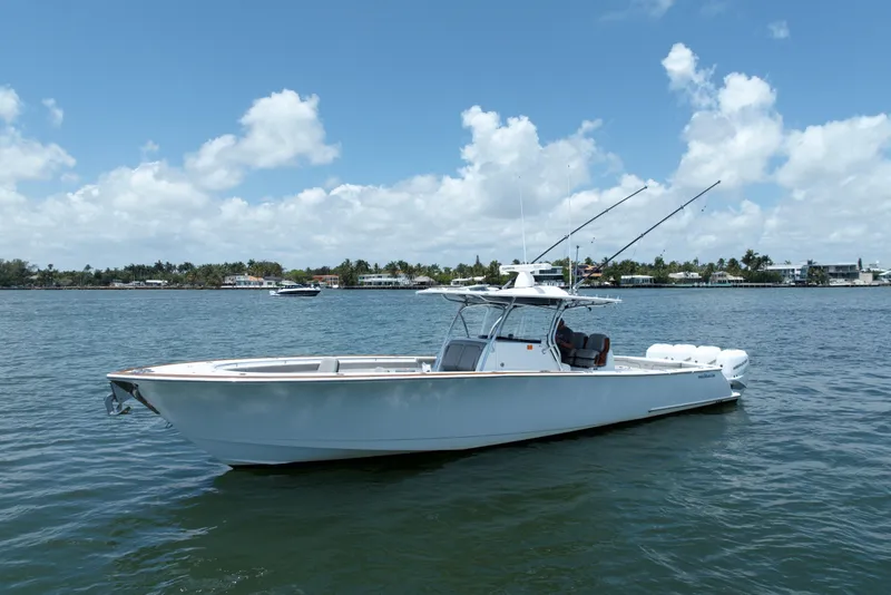 The Image of 2022 Valhalla Boatworks V-41 on calm water under a clear sky. - 0
