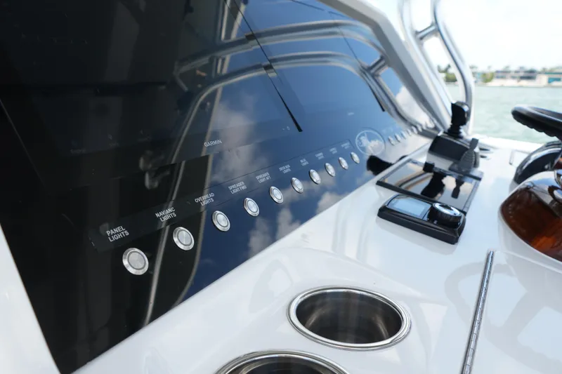 Slide: The Image of Control panel of 2022 Valhalla Boatworks V-41 with navigation and lighting controls. - 11