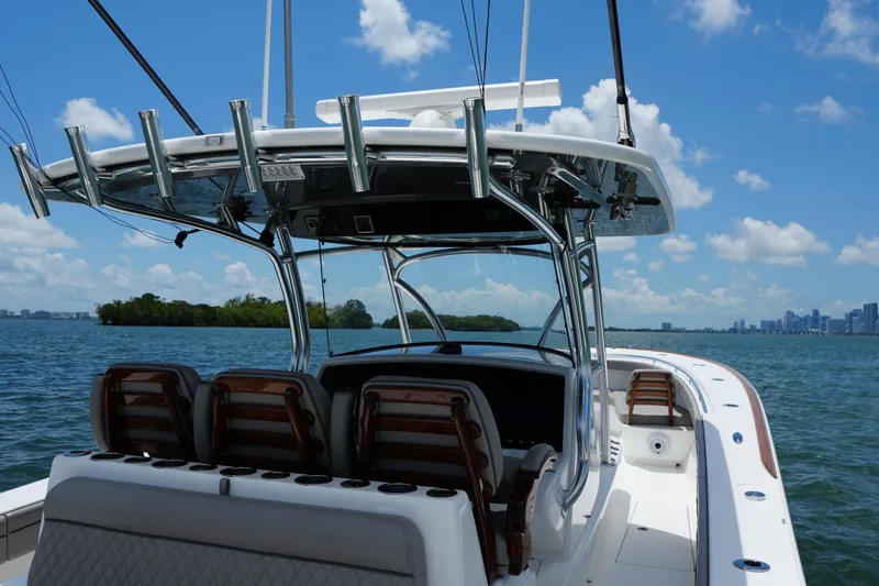 Slide: The Image of 2022 Valhalla Boatworks V-41 on water, featuring sleek design and spacious seating. - 13