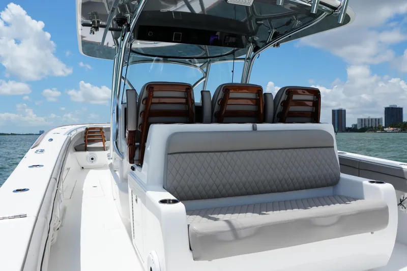 Slide: The Image of 2022 Valhalla Boatworks V-41 with sleek seating, cruising on a sunny day. - 16