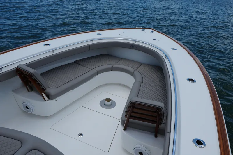 Slide: The Image of 2022 Valhalla Boatworks V-41 bow seating area on calm water. - 21