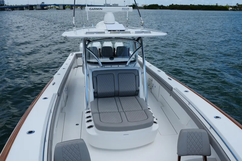 Slide: The Image of 2022 Valhalla Boatworks V-41 on water, featuring sleek design and comfortable seating. - 25