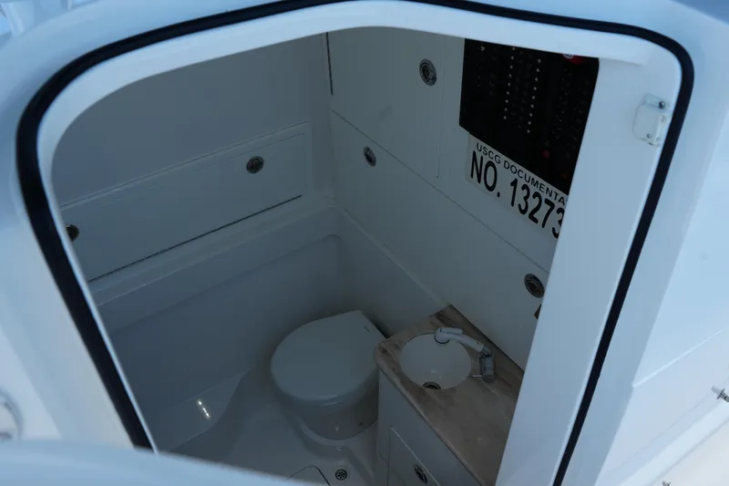 Slide: The Image of 2022 Valhalla Boatworks V-41 interior bathroom with toilet and sink. - 37