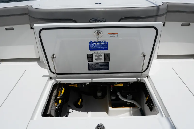 Slide: The Image of Open hatch on 2022 Valhalla Boatworks V-41, revealing internal components and storage area. - 39
