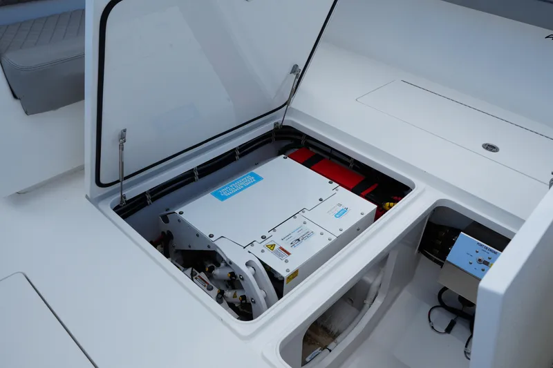 Slide: The Image of 2022 Valhalla Boatworks V-41 engine compartment with open hatch, showcasing internal components. - 40