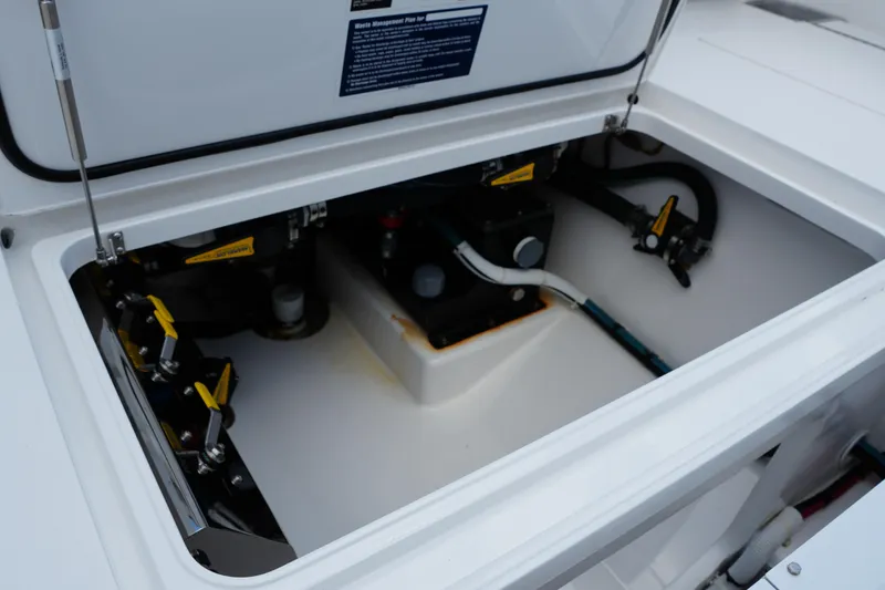 Slide: The Image of 2022 Valhalla Boatworks V-41 storage compartment with mechanical components and waste management system. - 44
