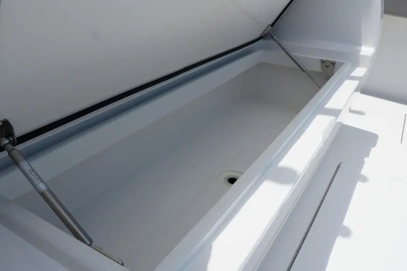 Slide: The Image of 2022 Valhalla Boatworks V-41 storage compartment with hydraulic lift, open and empty. - 47