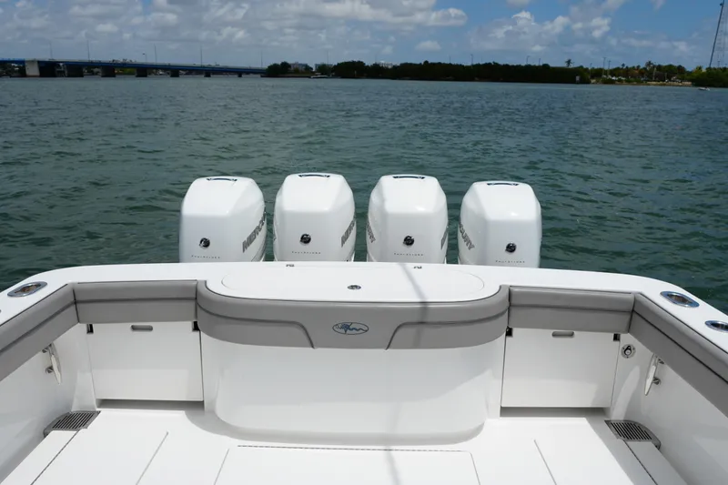 Slide: The Image of 2022 Valhalla Boatworks V-41 with four Mercury outboard engines on open water. - 49