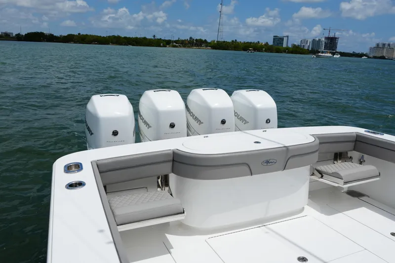 Slide: The Image of 2022 Valhalla Boatworks V-41 with four Mercury outboard engines on open water. - 51