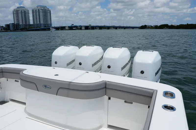 Slide: The Image of 2022 Valhalla Boatworks V-41 with four Mercury engines on a sunny day. - 52
