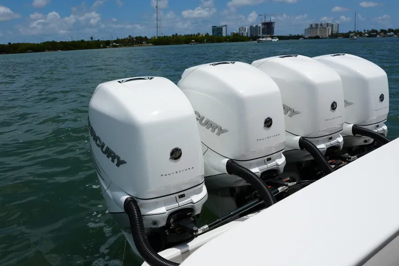 Slide: The Image of 2022 Valhalla Boatworks V-41 with four Mercury outboard engines on water. - 53