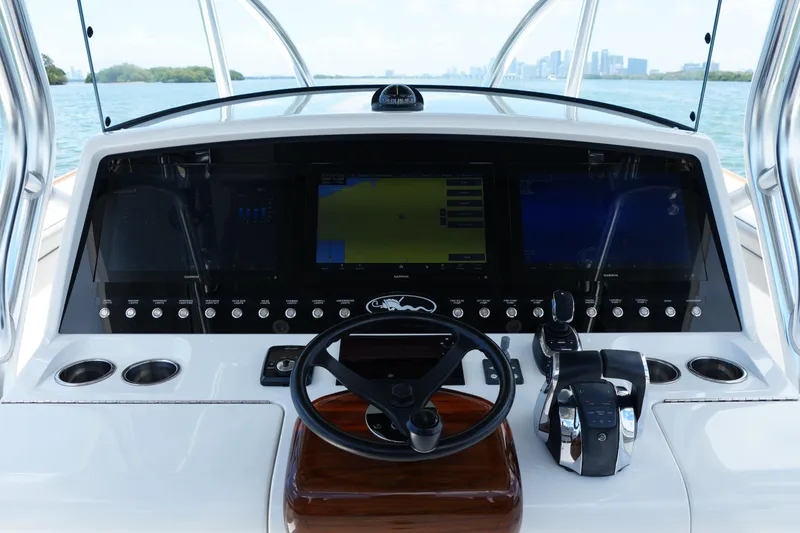 Slide: The Image of 2022 Valhalla Boatworks V-41 helm with advanced navigation displays and controls. - 8