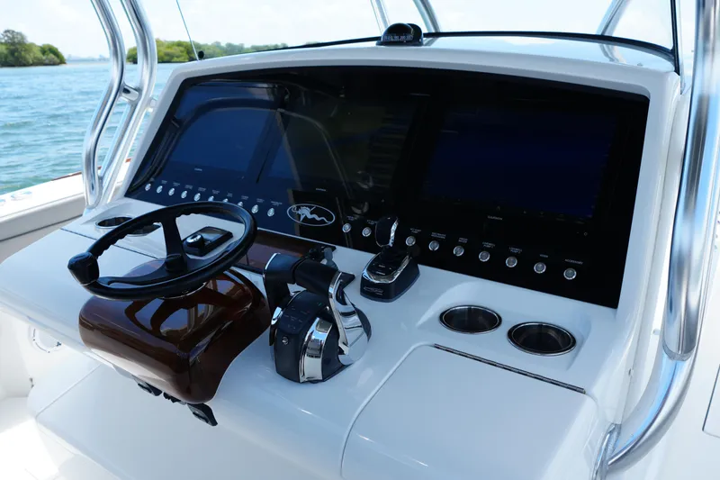 Slide: The Image of 2022 Valhalla Boatworks V-41 helm with advanced controls and navigation displays. - 9