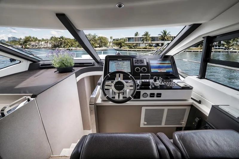 Slide: The Image of Luxurious 2019 Azimut 55 yacht cockpit with modern navigation systems and waterfront view. - 103