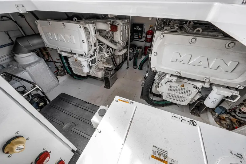 Slide: The Image of Engine room of 2019 Azimut 55 yacht featuring dual MAN engines. - 108