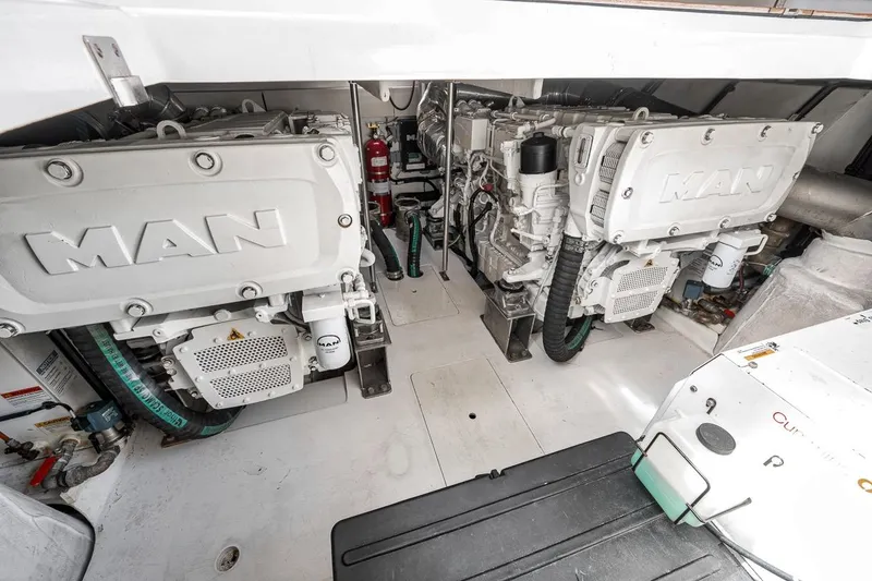 Slide: The Image of Engine room of 2019 Azimut 55 yacht featuring dual MAN engines. - 111
