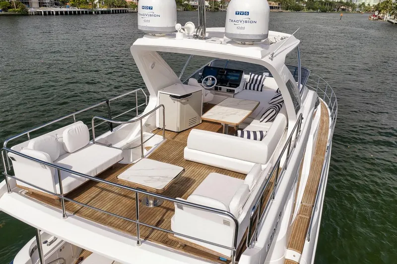 Slide: The Image of Luxurious 2019 Azimut 55 yacht with spacious deck and elegant seating. - 20