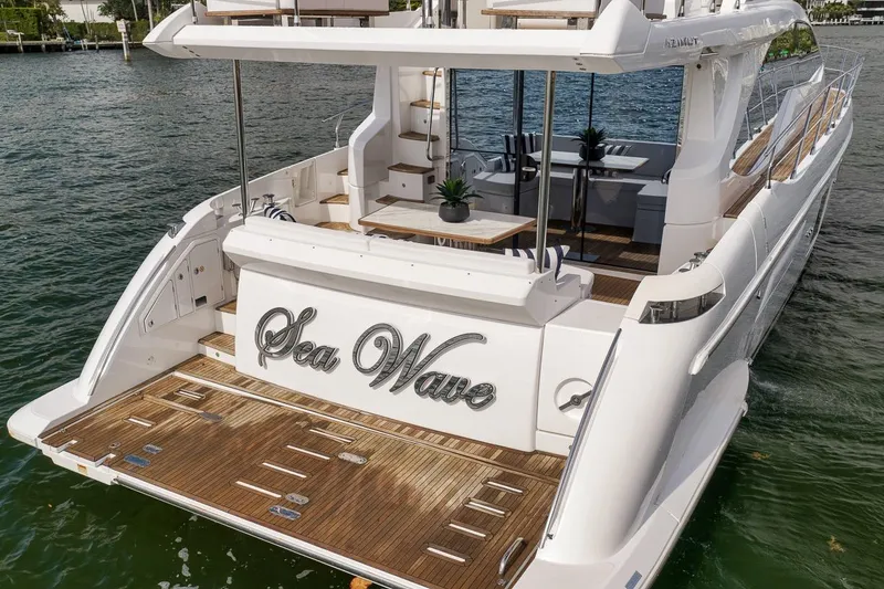 Slide: The Image of Luxury 2019 Azimut 55 yacht "Sea Wave" with elegant teak deck and stylish seating area. - 27