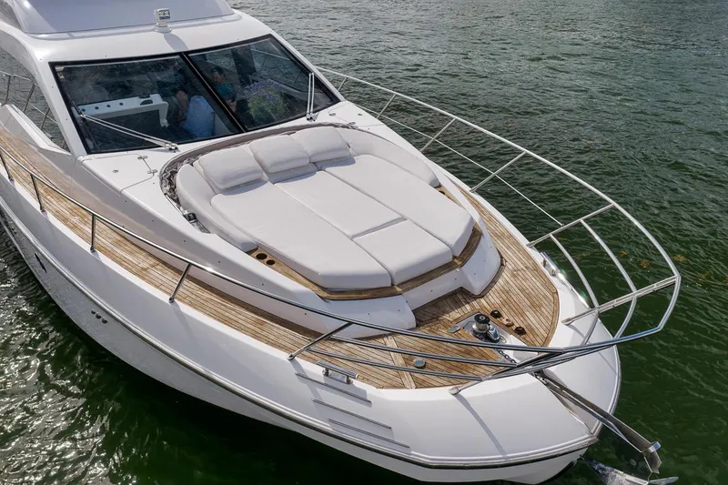 Slide: The Image of Luxurious 2019 Azimut 55 yacht with spacious sun deck on calm waters. - 30