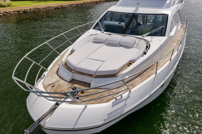 Slide: The Image of Luxurious 2019 Azimut 55 yacht with spacious deck and elegant design on calm waters. - 31