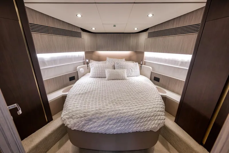Slide: The Image of Luxurious bedroom interior of 2019 Azimut 55 yacht with elegant bedding and modern lighting. - 47