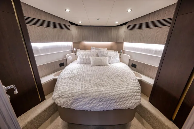 Slide: The Image of Luxurious bedroom interior of 2019 Azimut 55 yacht with elegant bedding and modern lighting. - 49