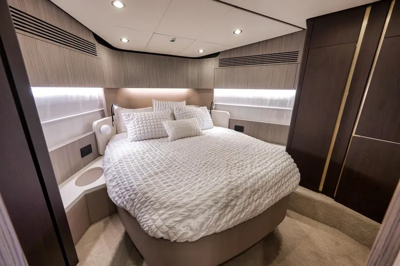 Slide: The Image of Luxurious bedroom interior of 2019 Azimut 55 yacht with elegant bedding and modern design. - 50