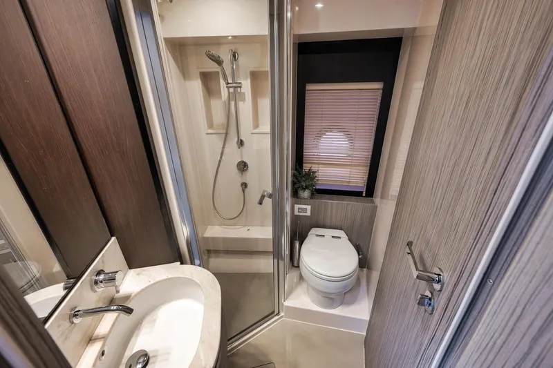 Slide: The Image of Luxurious bathroom in 2019 Azimut 55 yacht with shower and toilet. - 52