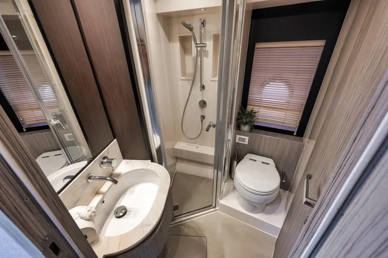 Slide: The Image of Luxurious bathroom interior of 2019 Azimut 55 yacht with modern fixtures and elegant design. - 53