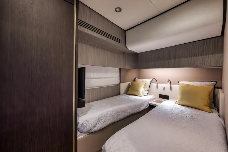 Slide: The Image of Luxurious twin cabin interior on 2019 Azimut 55 yacht with elegant bedding. - 60