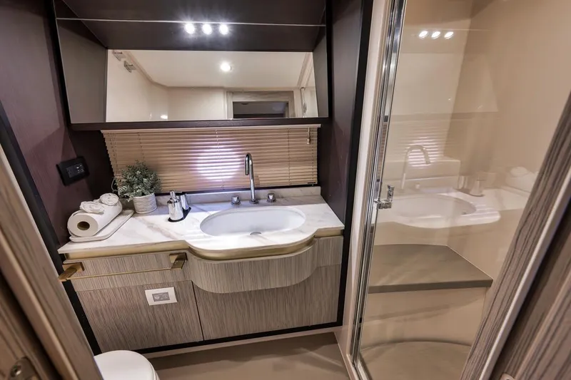 Slide: The Image of Luxurious bathroom interior of 2019 Azimut 55 yacht with modern fixtures and elegant design. - 61