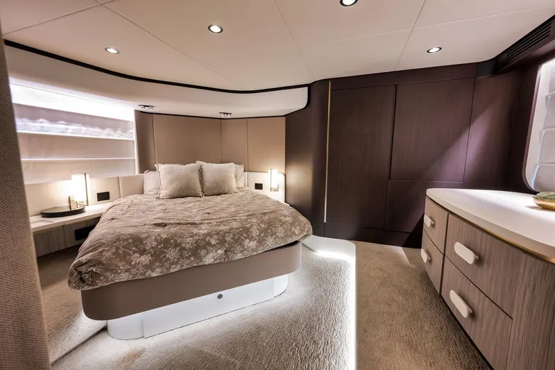 Slide: The Image of Luxurious bedroom interior of 2019 Azimut 55 yacht with modern design and ambient lighting. - 64