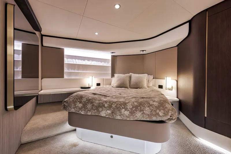 Slide: The Image of Luxurious bedroom interior of 2019 Azimut 55 yacht with elegant decor and ambient lighting. - 66