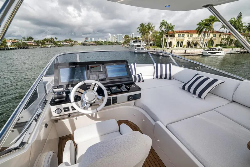 Slide: The Image of Luxurious 2019 Azimut 55 yacht helm with plush seating and modern navigation systems. - 81