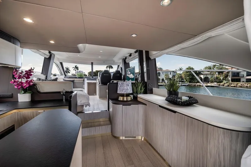 Slide: The Image of Luxurious interior of 2019 Azimut 55 yacht with modern decor and waterfront view. - 93