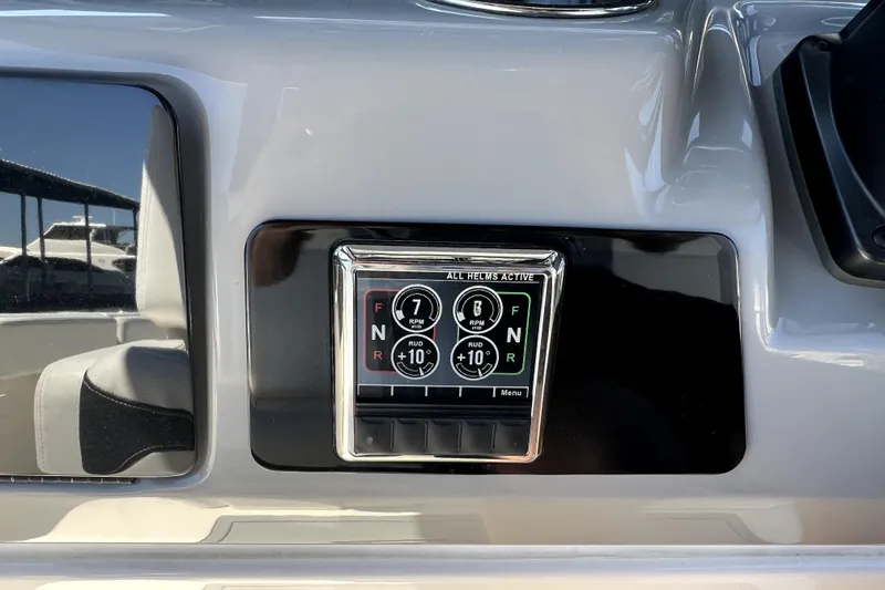 Slide: The Image of 2021 Robalo R272 Center Console helm display with control panel. - 21