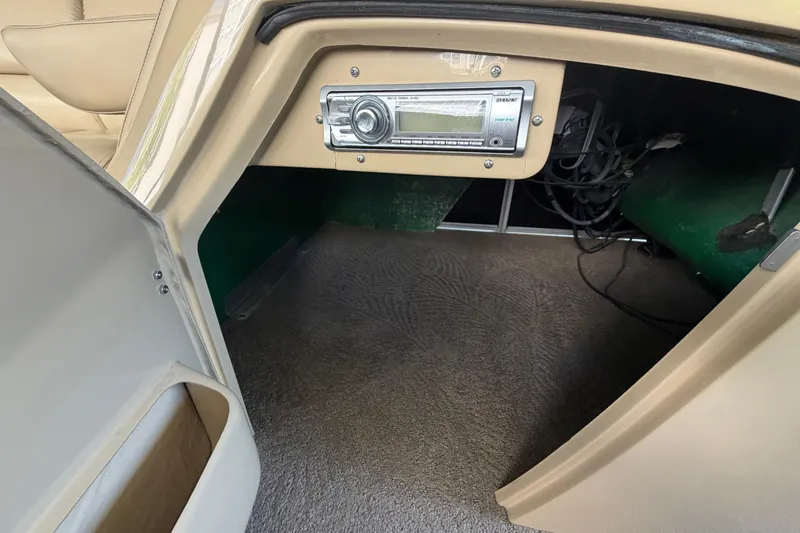 Slide: The Image of Interior view of a 2011 Bennington 2575QCW OB boat with stereo system. - 22