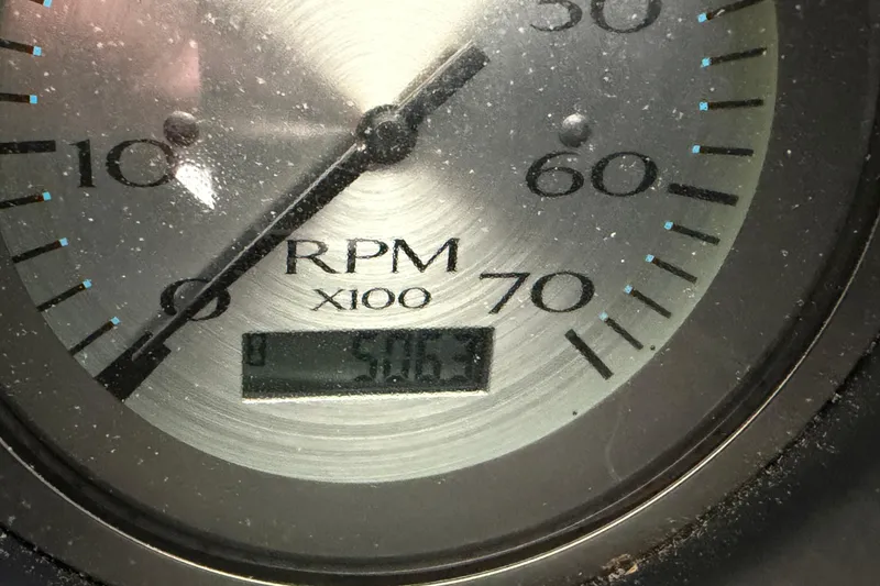Slide: The Image of Close-up of a Bennington 2575QCW OB 2011 RPM gauge displaying 5063 RPM. - 27