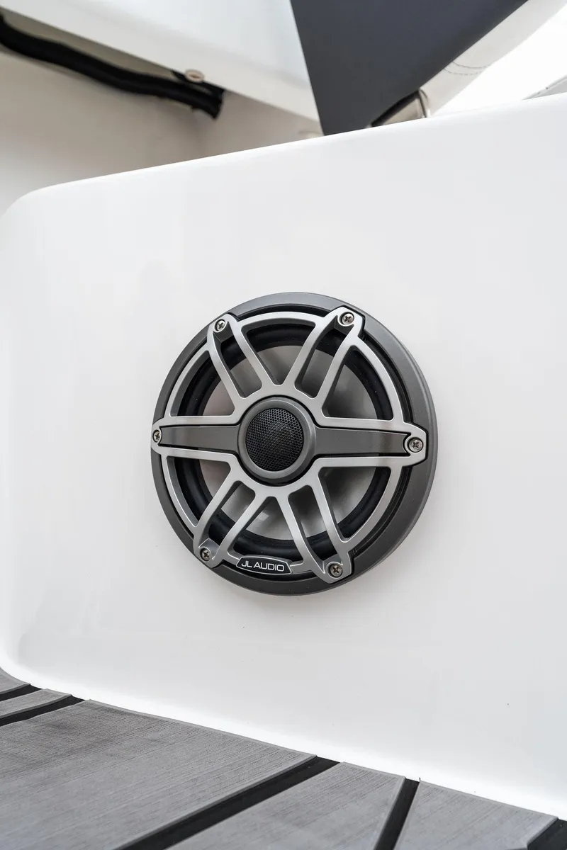 Slide: The Image of Close-up of a speaker on a 2023 Fountain 38 CC boat. - 15