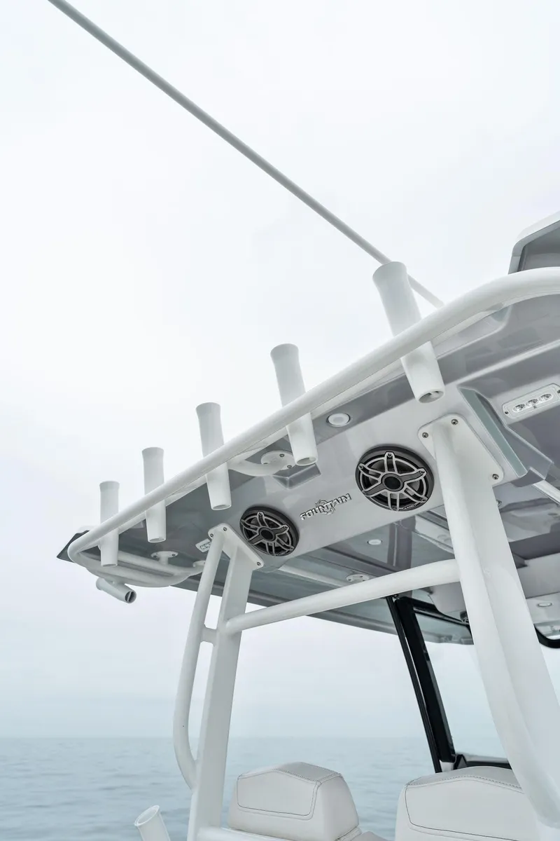 Slide: The Image of 2023 Fountain 38 CC boat with rod holders and speakers. - 26