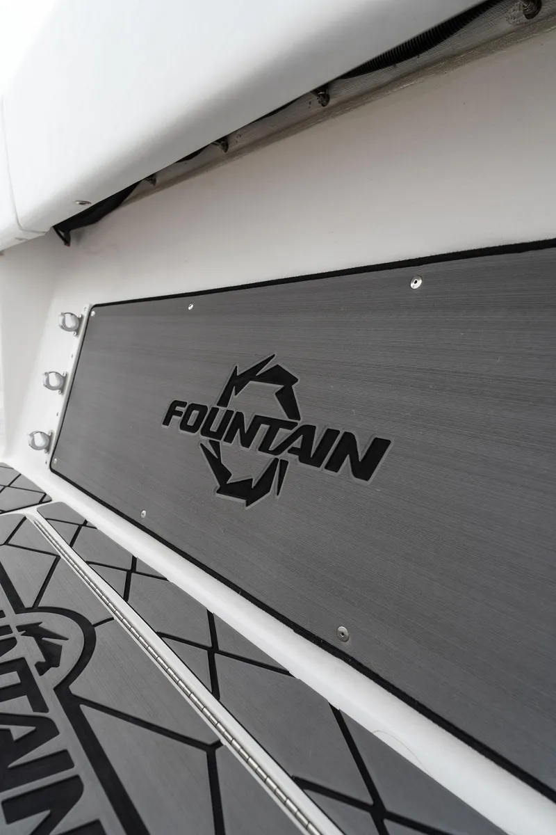 Slide: The Image of 2023 Fountain 38 CC boat deck with logo. - 29