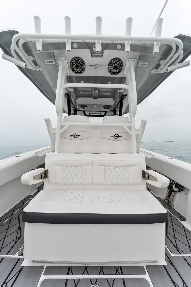 Slide: The Image of 2023 Fountain 38 CC boat with white seating and modern design. - 33