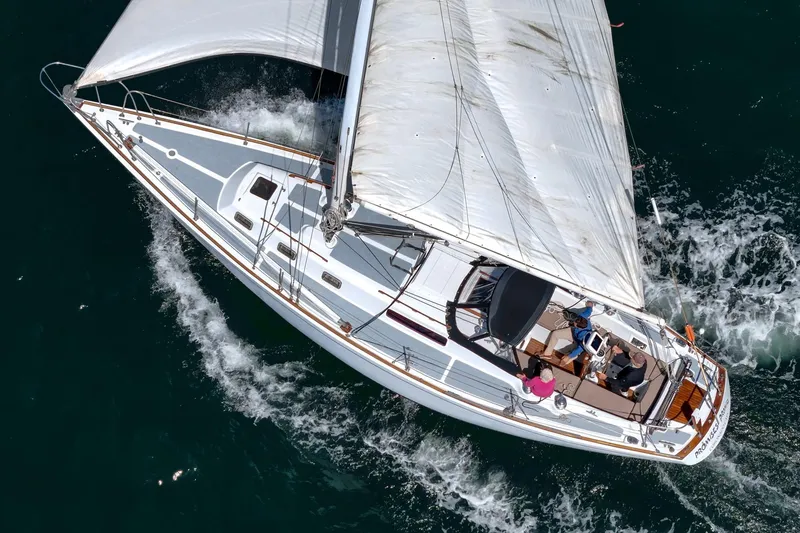 Slide: The Image of Aerial view of a 1970 Morgan 42 MKI sailboat navigating through the ocean. - 17