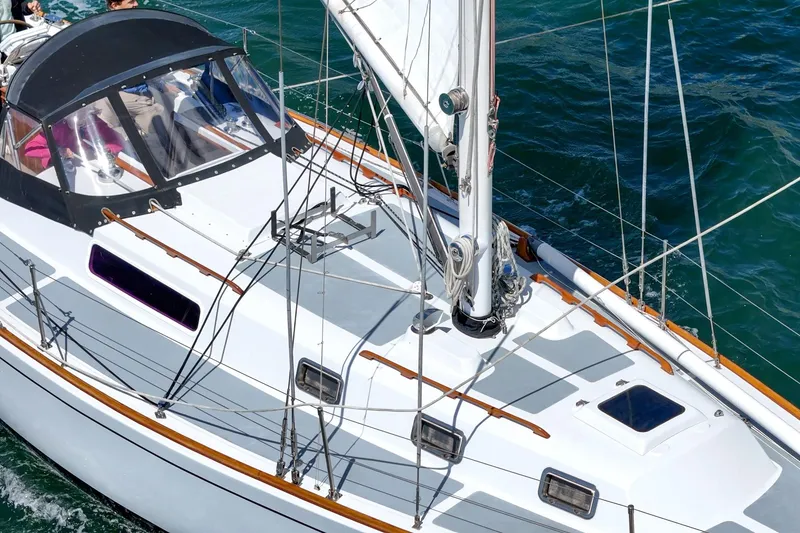 Slide: The Image of 1970 Morgan 42 MKI sailboat on water, featuring sleek deck and rigging. - 20