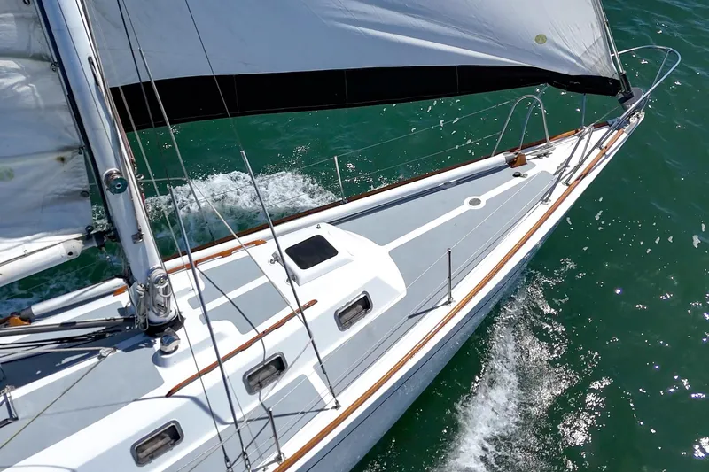 Slide: The Image of Sailing yacht Morgan 42 MKI from 1970 gliding on clear blue waters. - 21