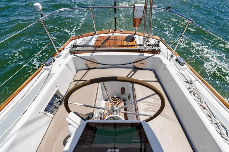 Slide: The Image of Cockpit view of a 1970 Morgan 42 MKI sailboat on open water. - 25